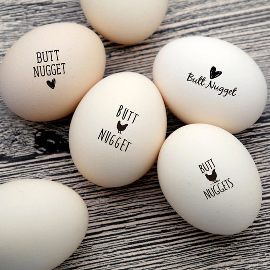 mini egg stamps, imprinted on the farm eggs with BUTT NUGGET Word and heart or hen .