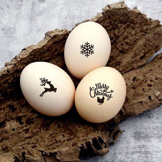 mini egg stamps, imprinted on the farm eggs with graphic of snowflake, Merry Christmas hen and Xmas deer.