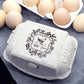 Custom Egg Carton Stamp, with your name and chicken flower graphic, imprinted on the egg carton.