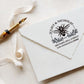A personalized self inking address stamp, customized with your name and address, bee and flower, stamped on the white envelop, beside it, a ribbon is waiting for packing the gift.