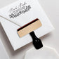 A personalized self inking address stamp, customized with your name, address and flower, stamped on the invitation card.