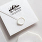 A self inking return address stamp, customized with your mountain name and address, stamped on the white envelop of invitation card, a wax seal sealed the envelope.