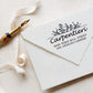 A personalized self inking address stamp, customized with your name, address and flower, stamped on the white envelop, beside it, a ribbon is waiting for packing the gift.